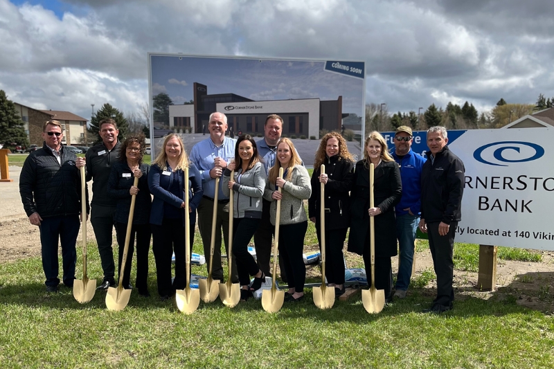 Cornerstone Bank team members breaking ground on new location