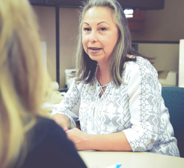 Kathy meeting with a customer